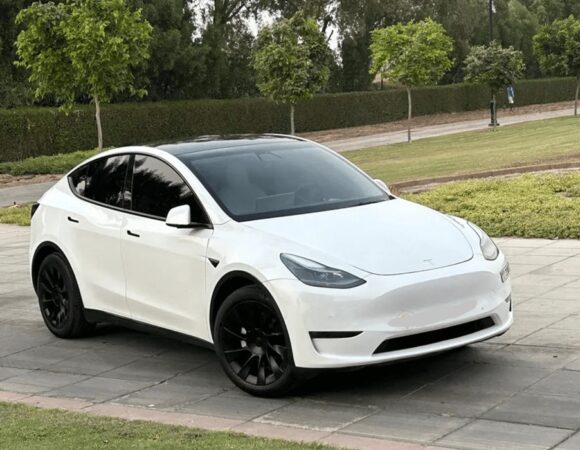 Tesla Model Y with Driver in Dubai
